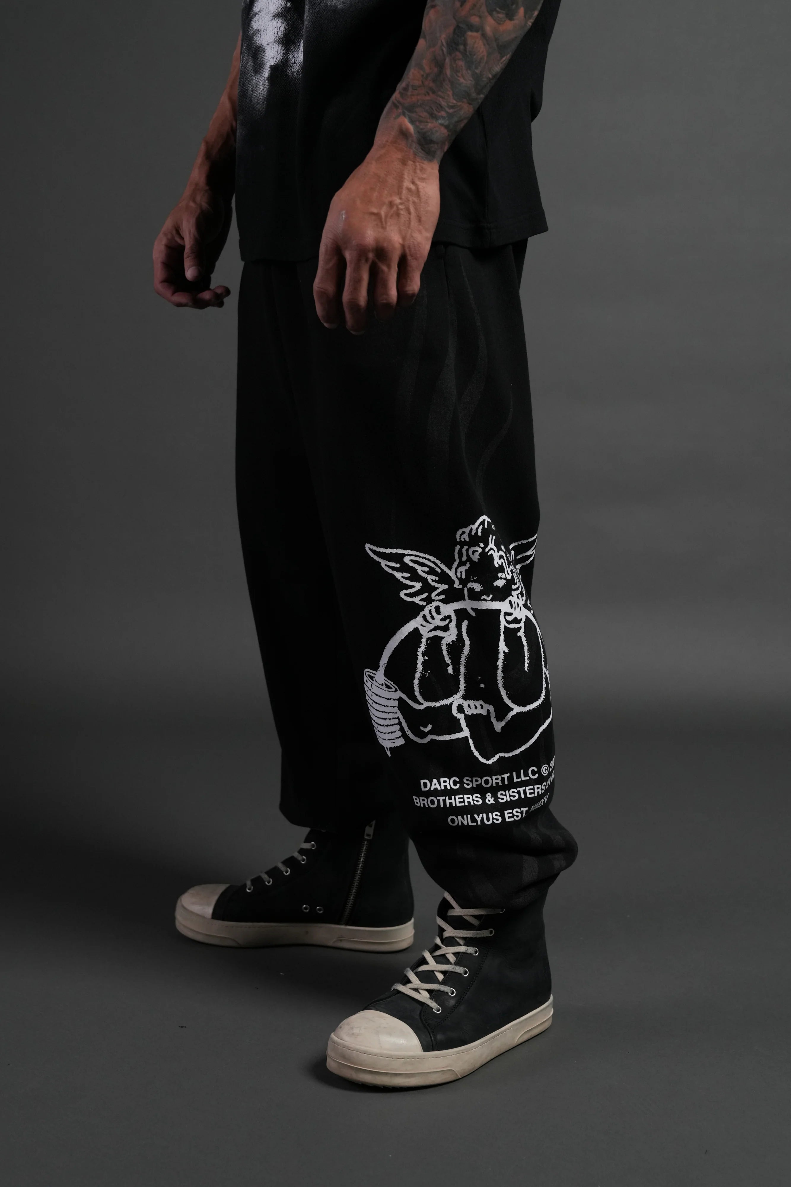 Powerhouse of the Cherub Unisex Lightweight Lounger Sweat Pants in Black Drift Wash